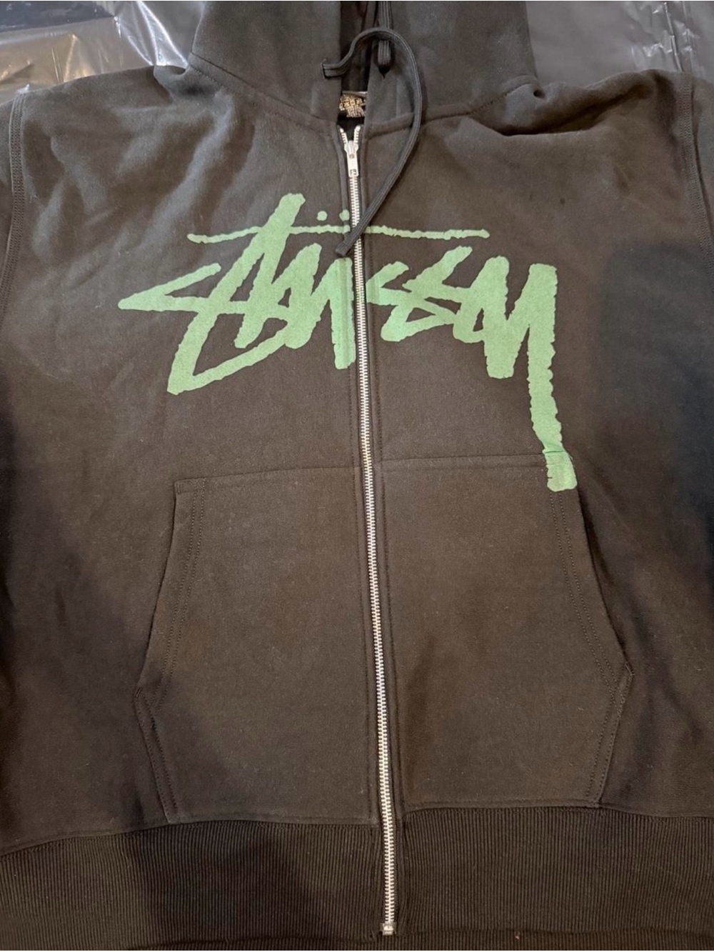 Stussy Black Zip Hoodie with Green Logo Print